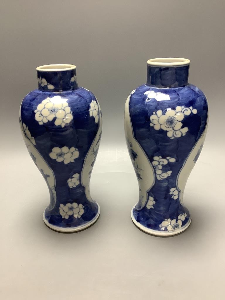 A pair of Chinese blue and white vases, Kangxi mark c.1900, height 22.5cm